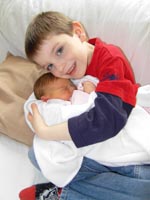 Emma gets a cuddle from Thomas
